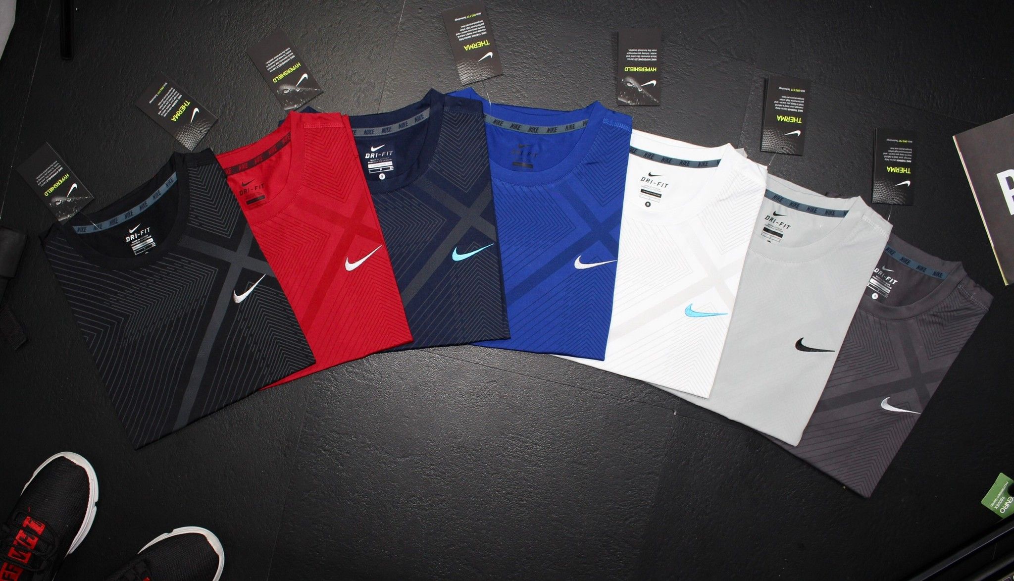 Áo nam nike kẻ ngực