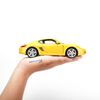  Mô hình xe Porsche Cayman S Yellow 1:24 Welly 