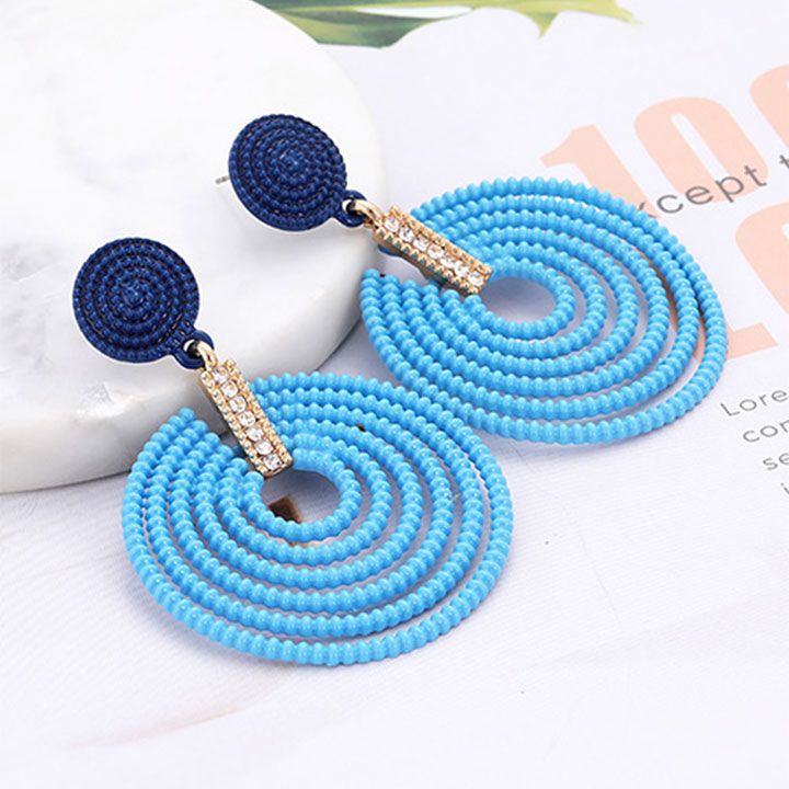Bông tai lốc xoáy xanh
