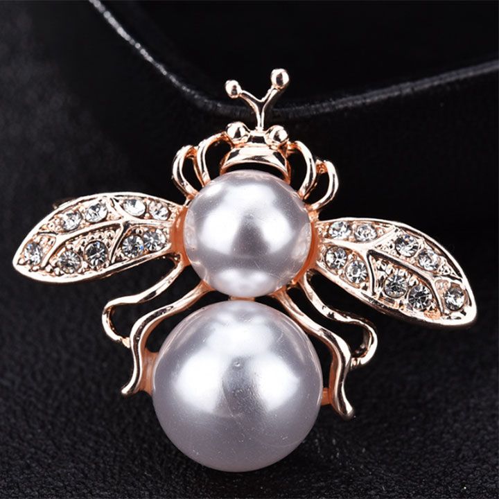 Cài áo ve trắng