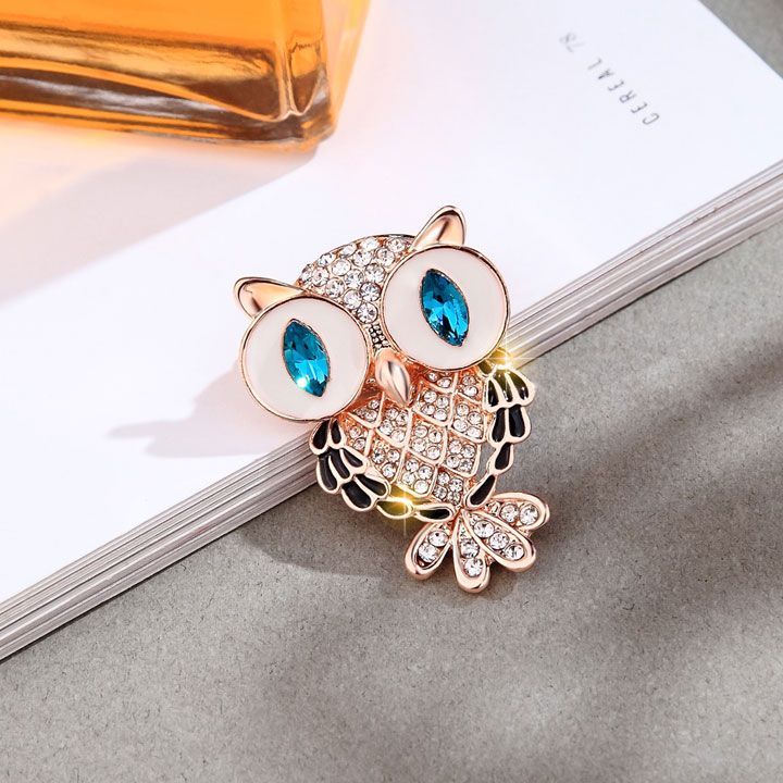 Cài áo cú mắt xanh