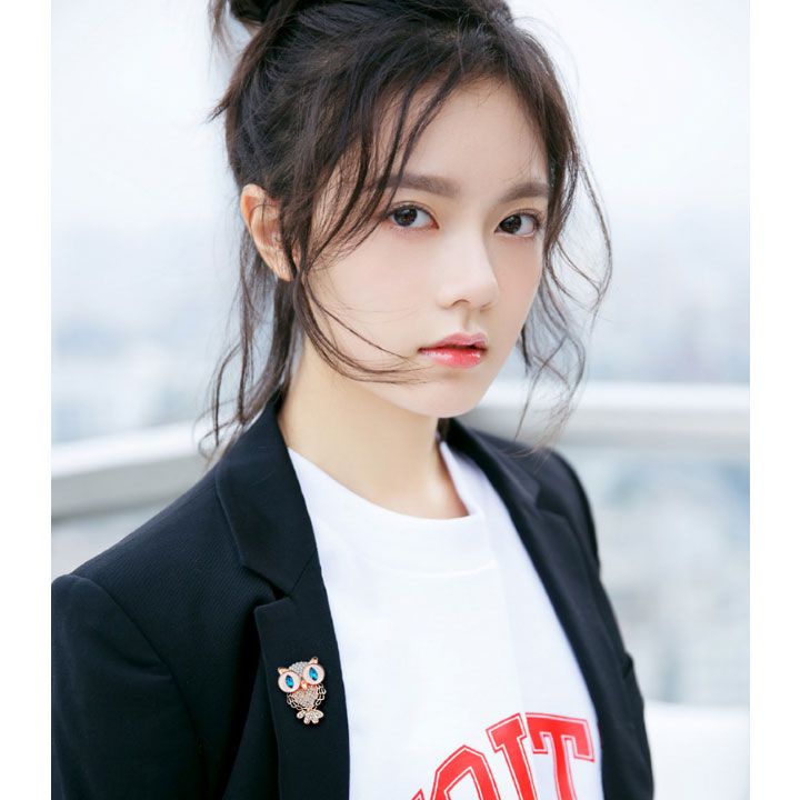Cài áo cú mắt xanh