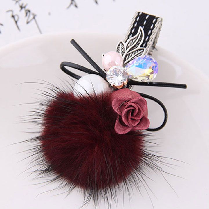 Kẹp tóc cục bông đỏ