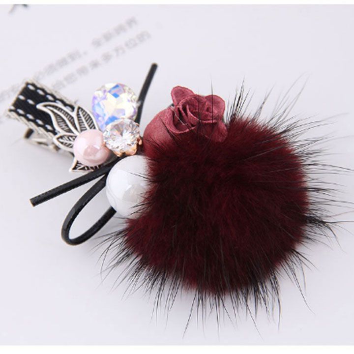 Kẹp tóc cục bông đỏ