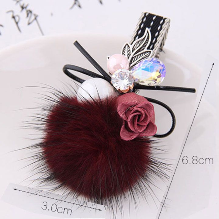 Kẹp tóc cục bông đỏ