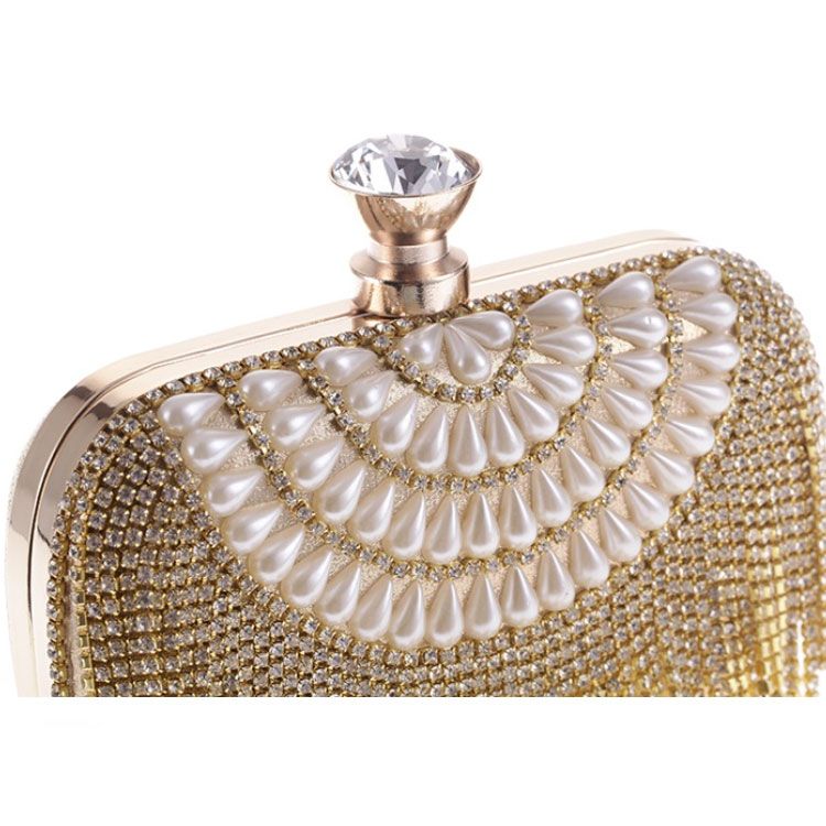 Clutch cầm tay đi tiệc tua rua hạt châu vàng