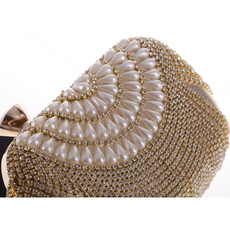 Clutch cầm tay đi tiệc tua rua hạt châu vàng