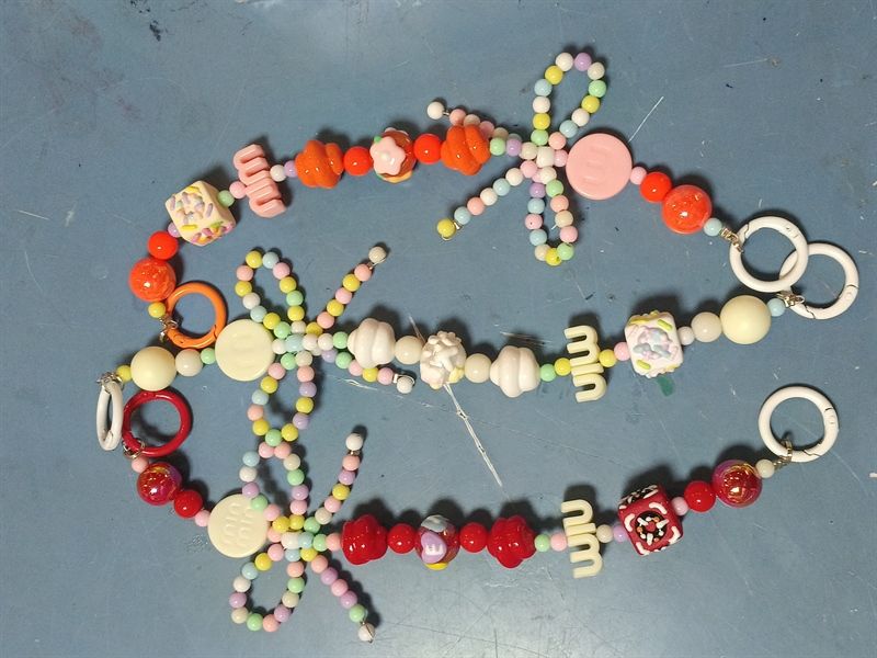 PK DÂY ĐEO ĐIỆN THOẠI CHARM MIUMIU