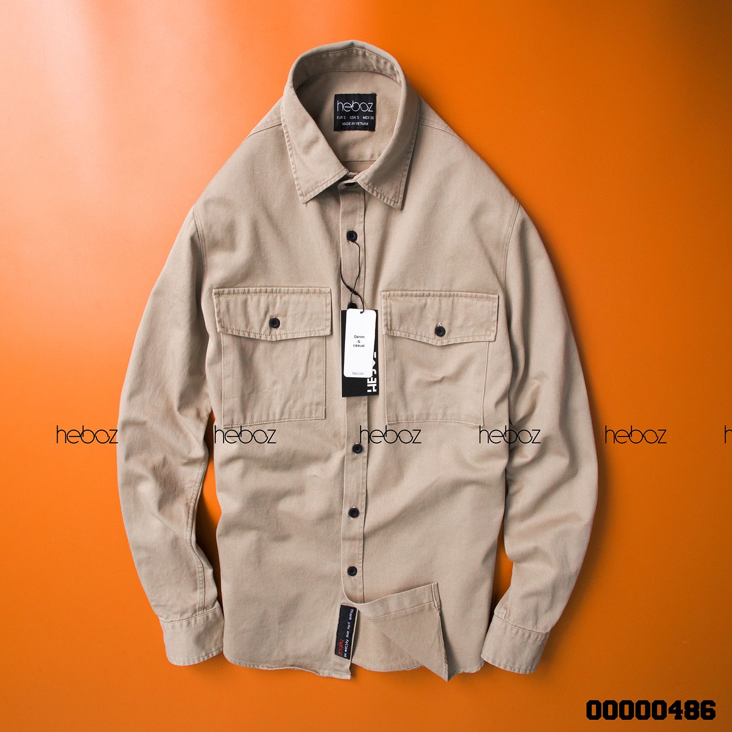 Áo denim Heboz 2 túi 5M new