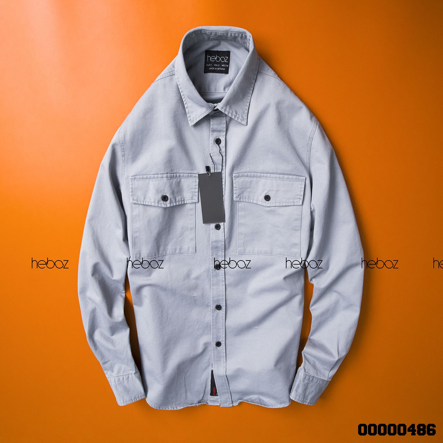 Áo denim Heboz 2 túi 5M new