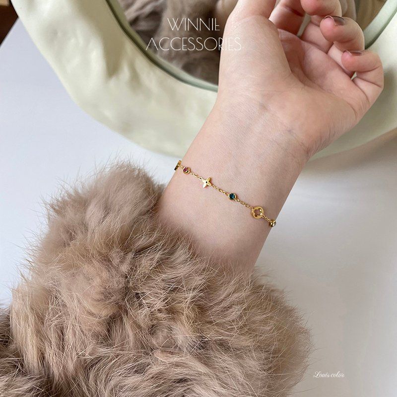 Lắc tay Titan Louis color