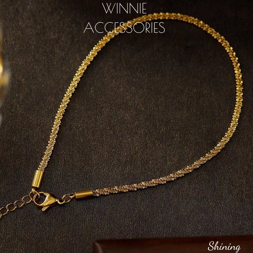 Lắc chân titan Shining VG
