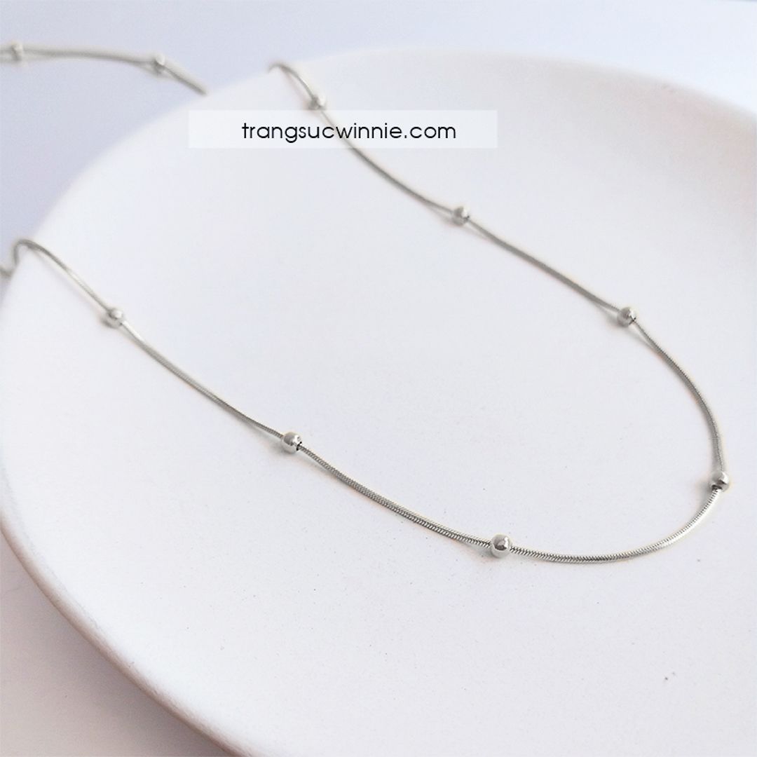 Dây chuyền titan bi