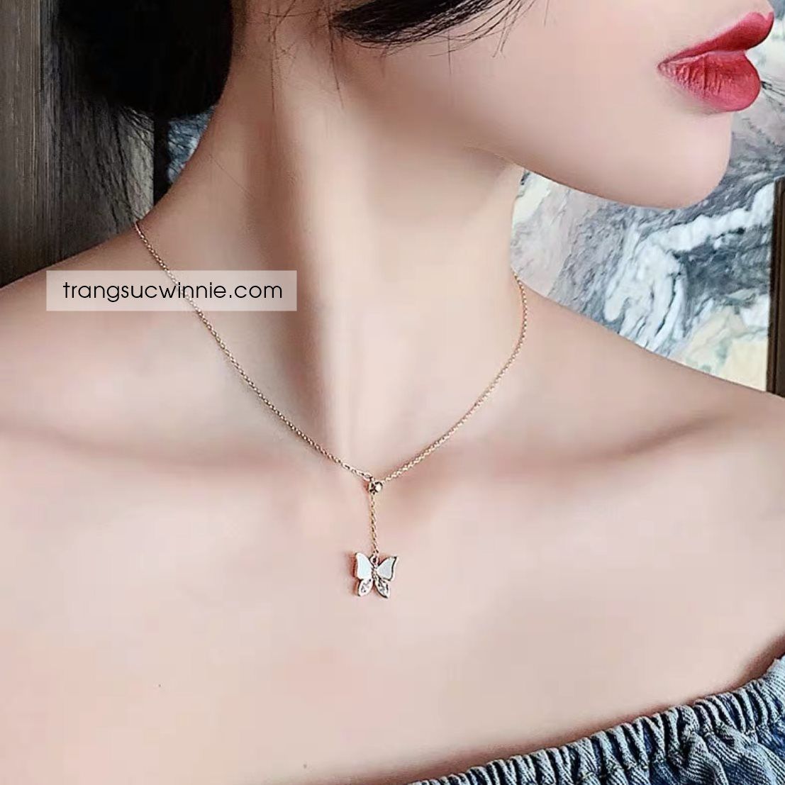 Dây chuyền titan Bướm xà cừ V