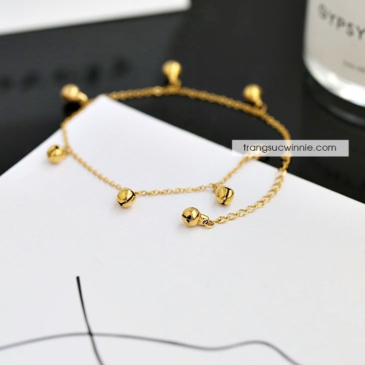Lắc chân titan chuông VG