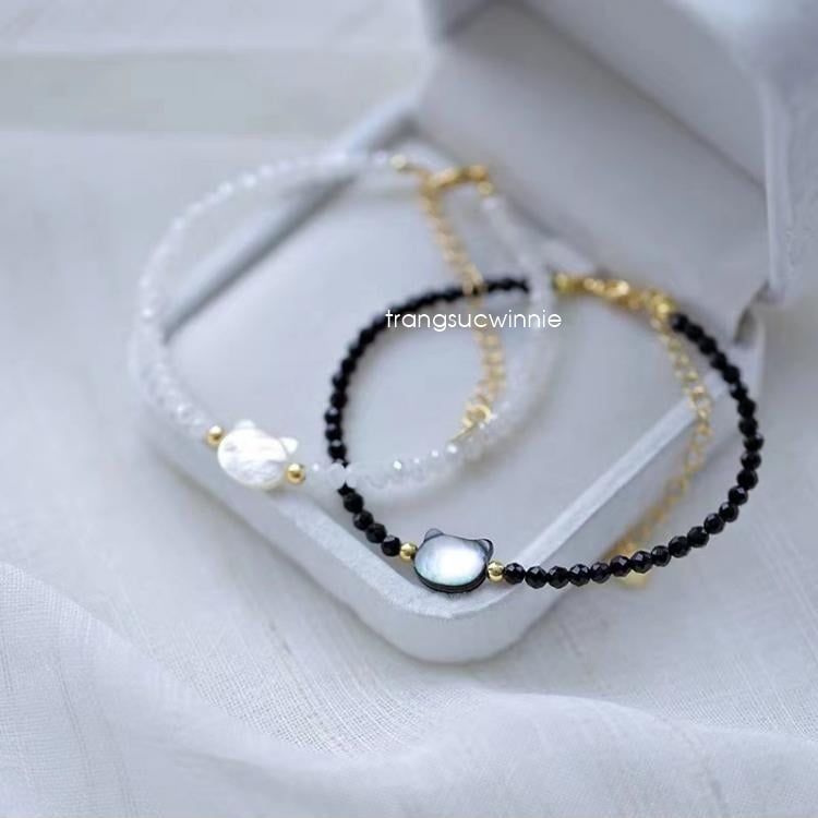 Lắc tay mèo đen trắng