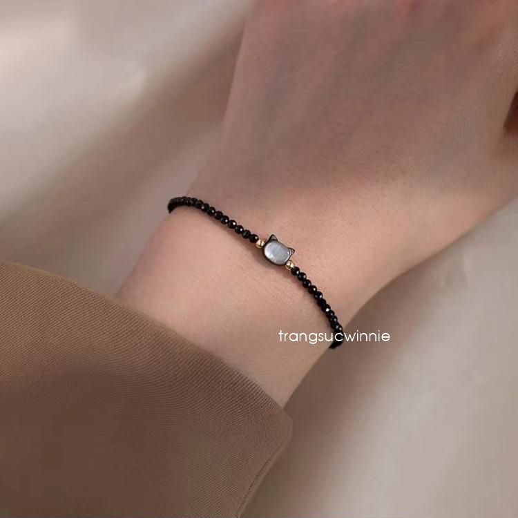 Lắc tay mèo đen trắng