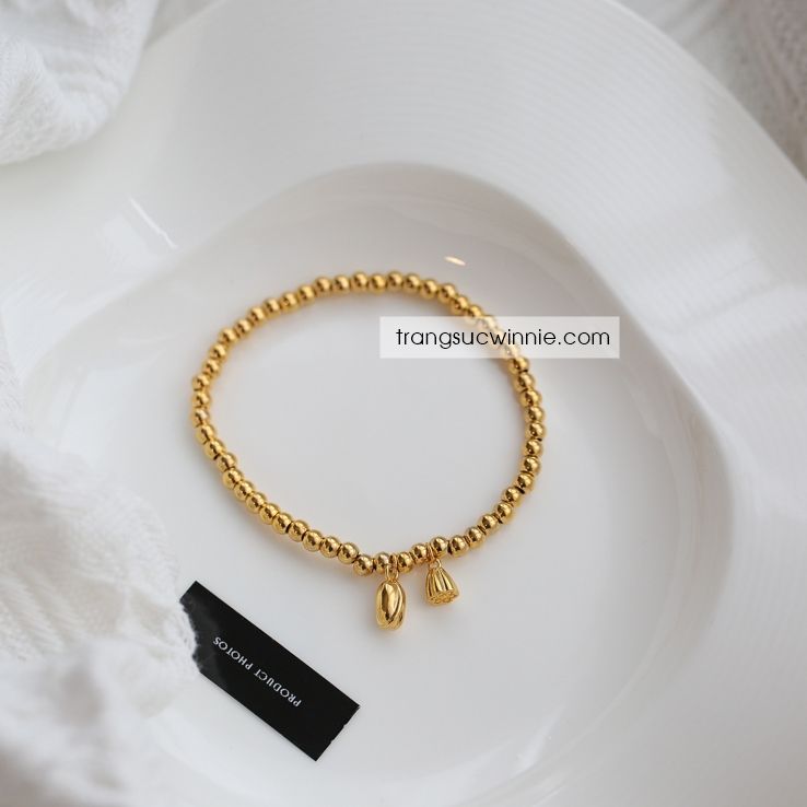 Lắc tay titan Lotus