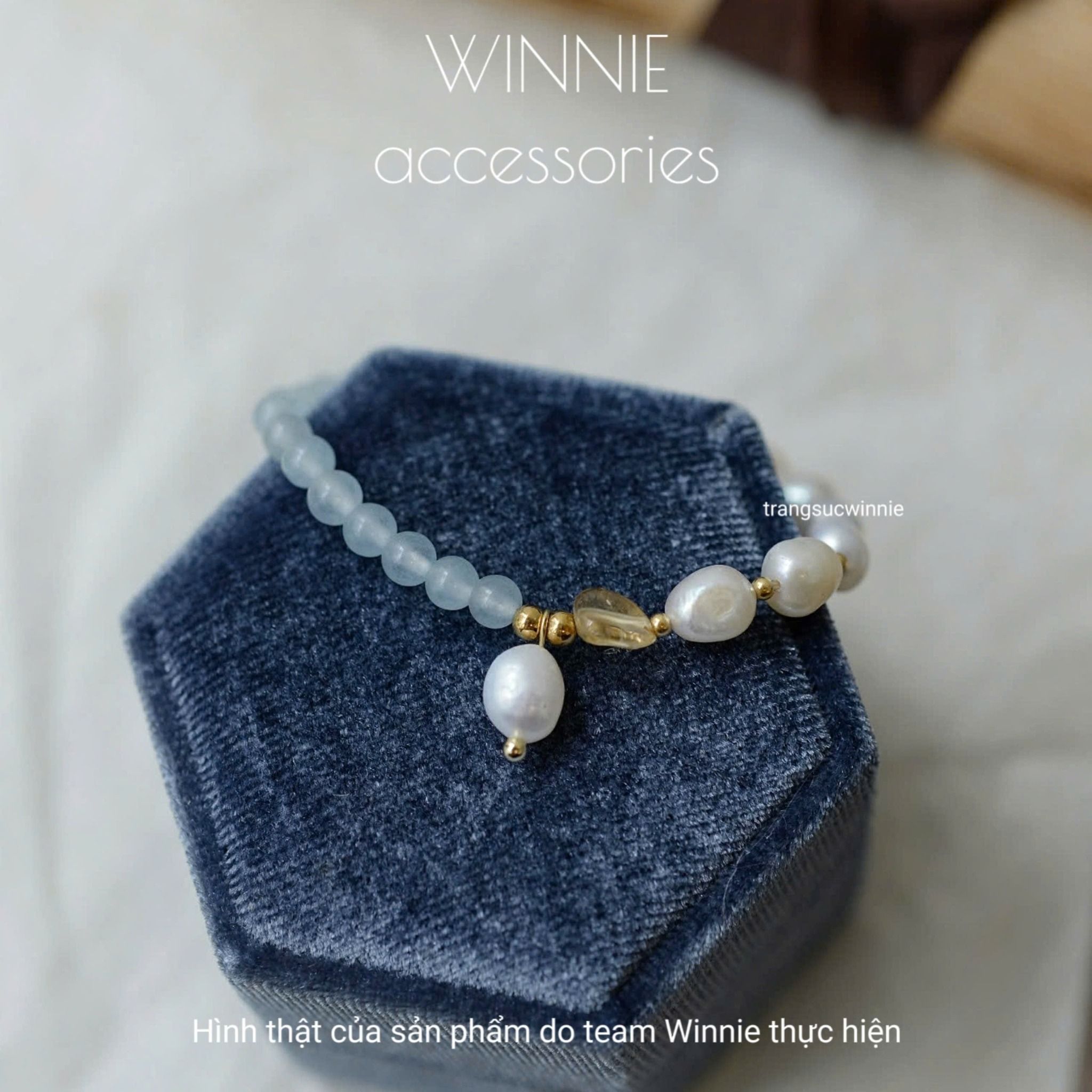 Lắc tay Titan ngọc trai Aqua