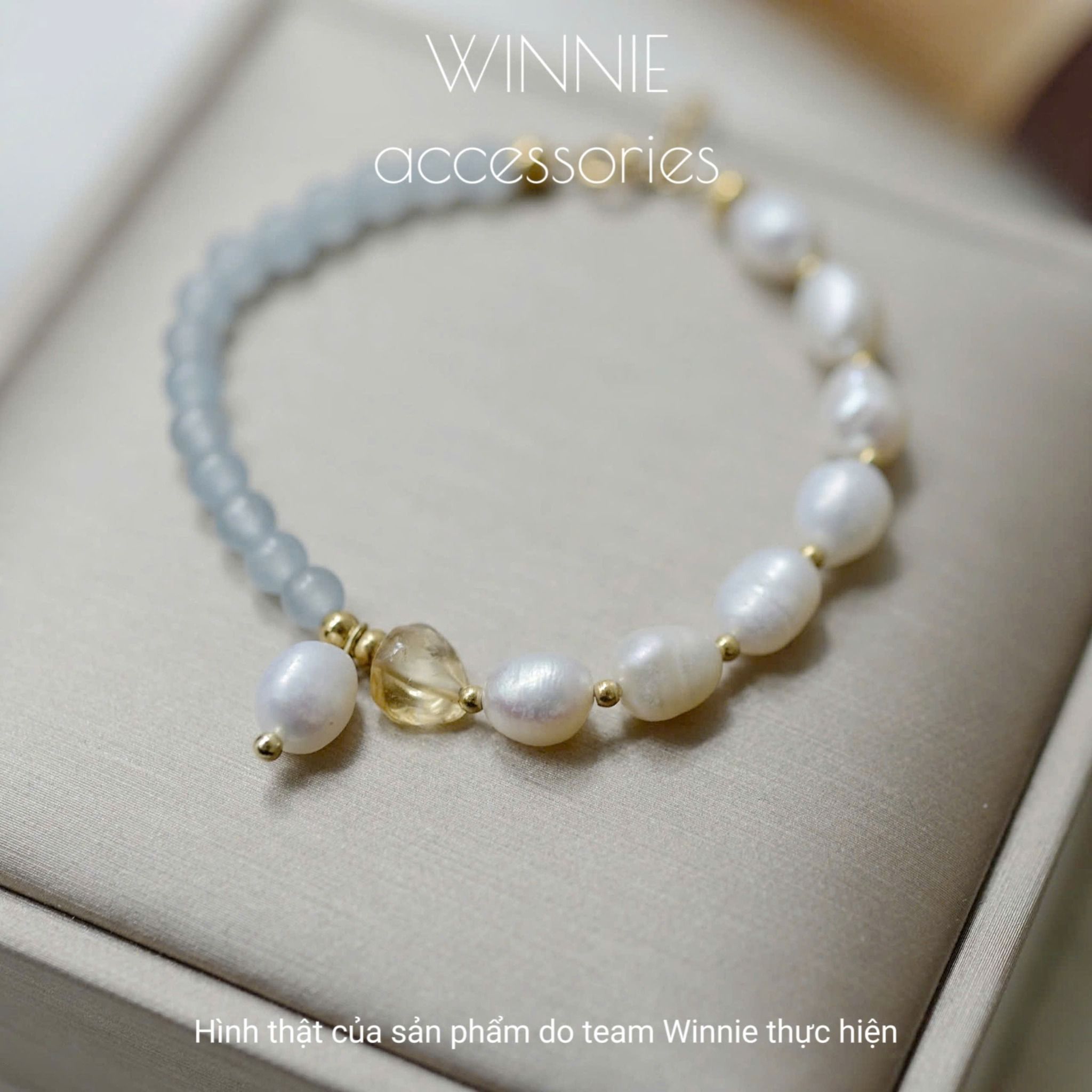 Lắc tay Titan ngọc trai Aqua