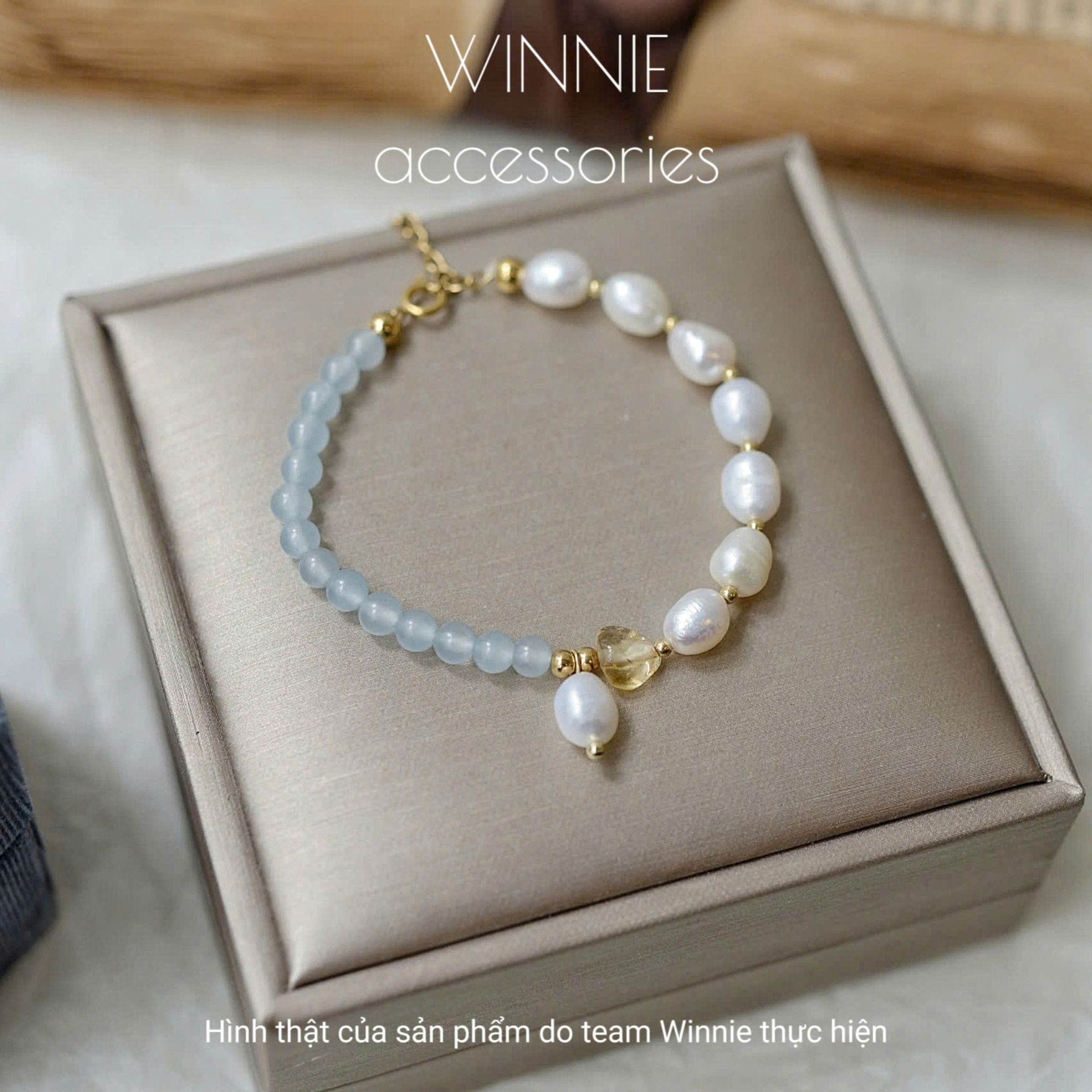 Lắc tay Titan ngọc trai Aqua