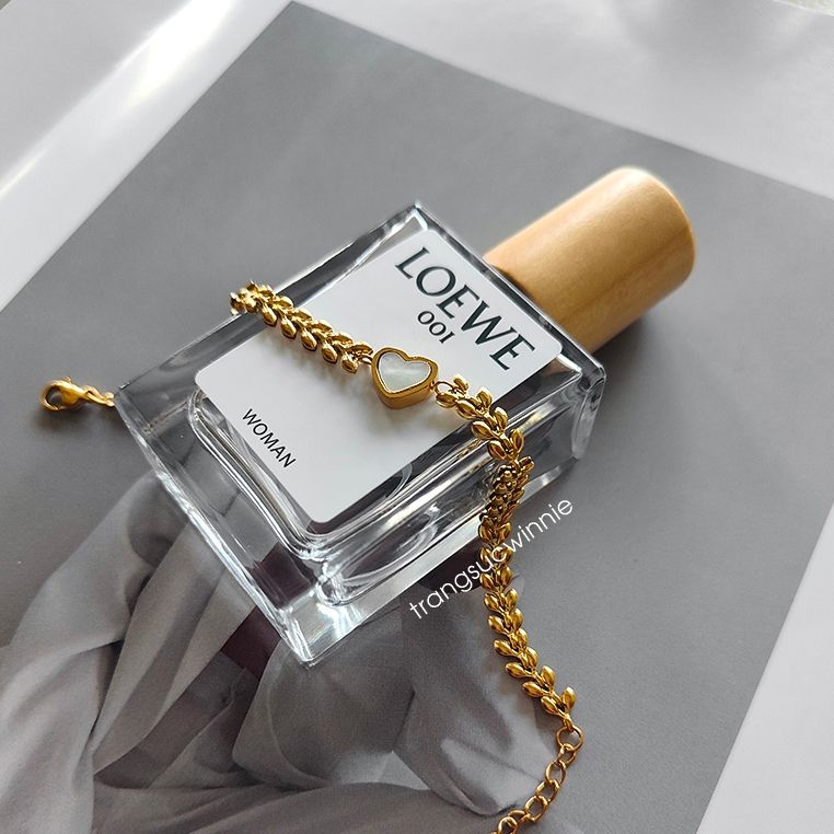 Lắc tay titan Wheat nacre heart
