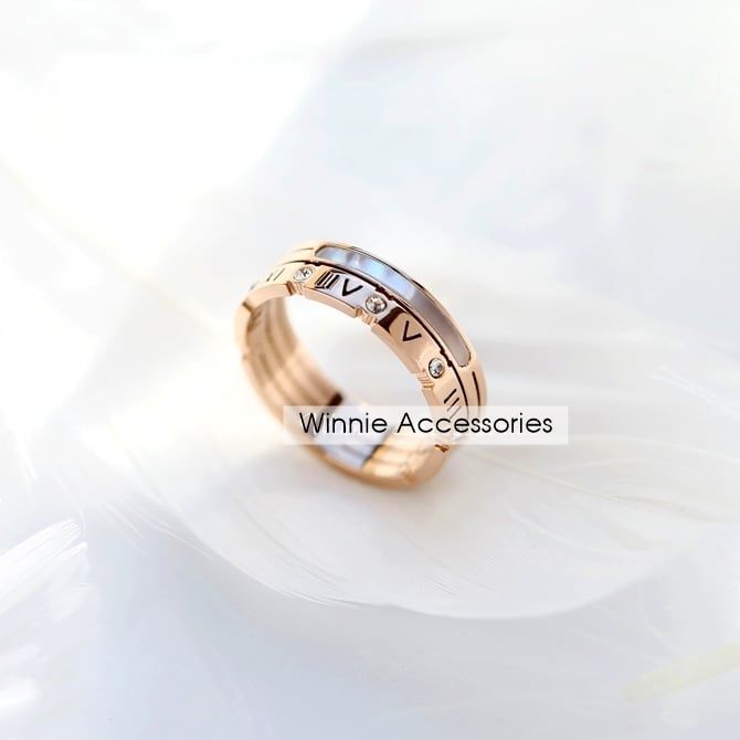 Nhẫn titan roman xà cừ
