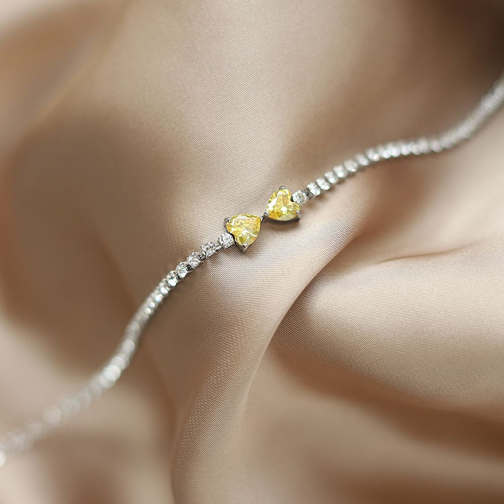 Lắc tay Titan Bowknot