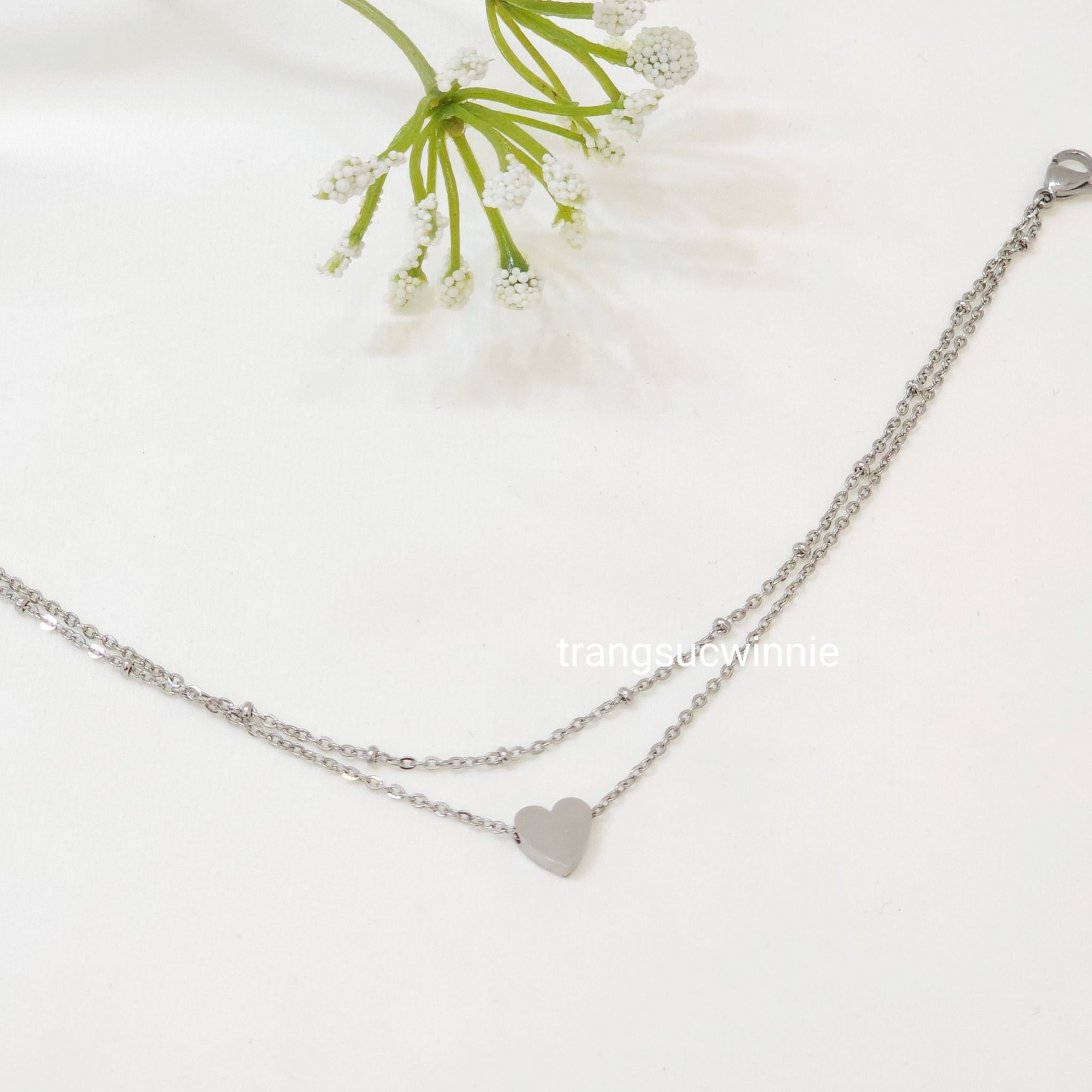 Lắc chân titan Layer 1 tim