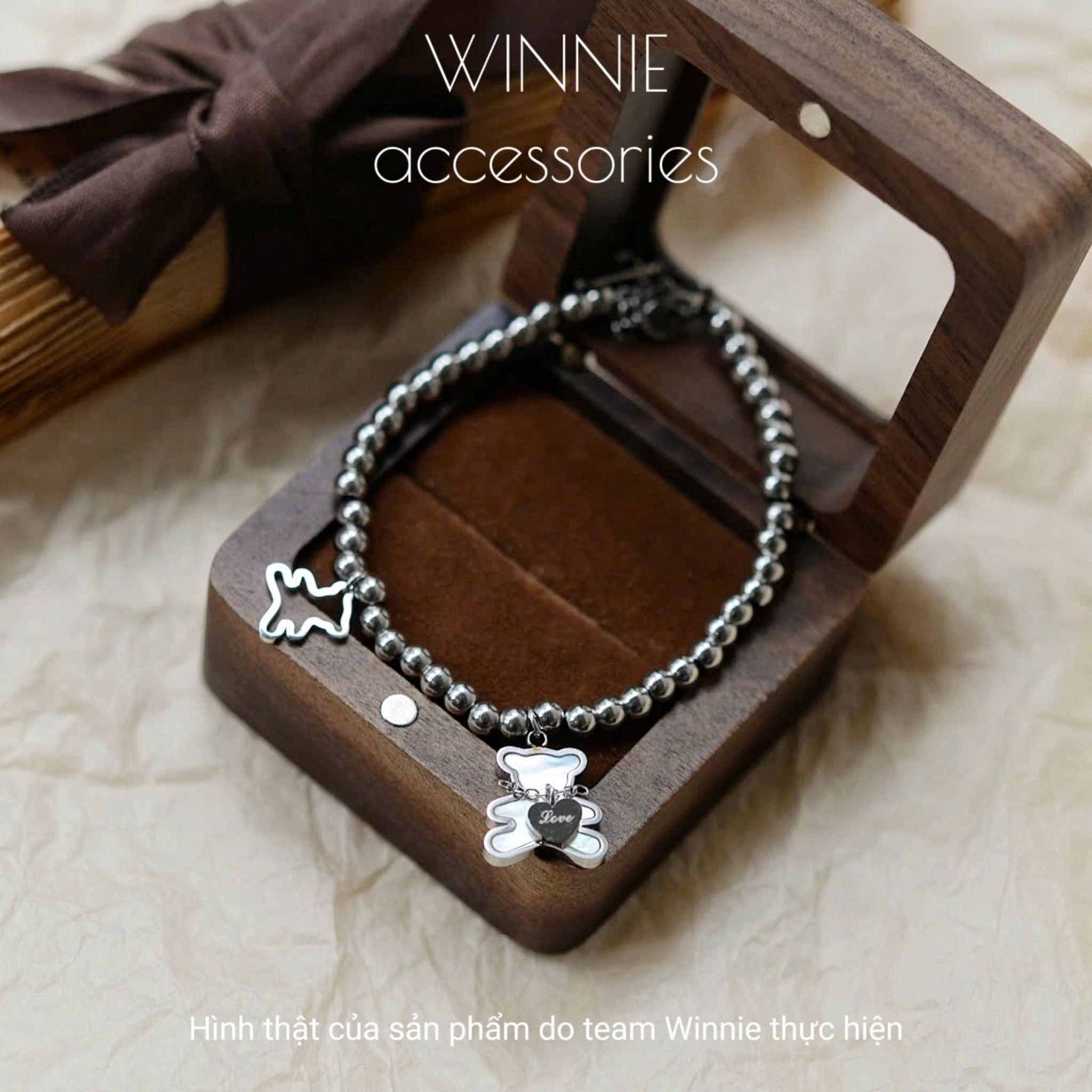 Lắc tay titan Nacre Teddy B