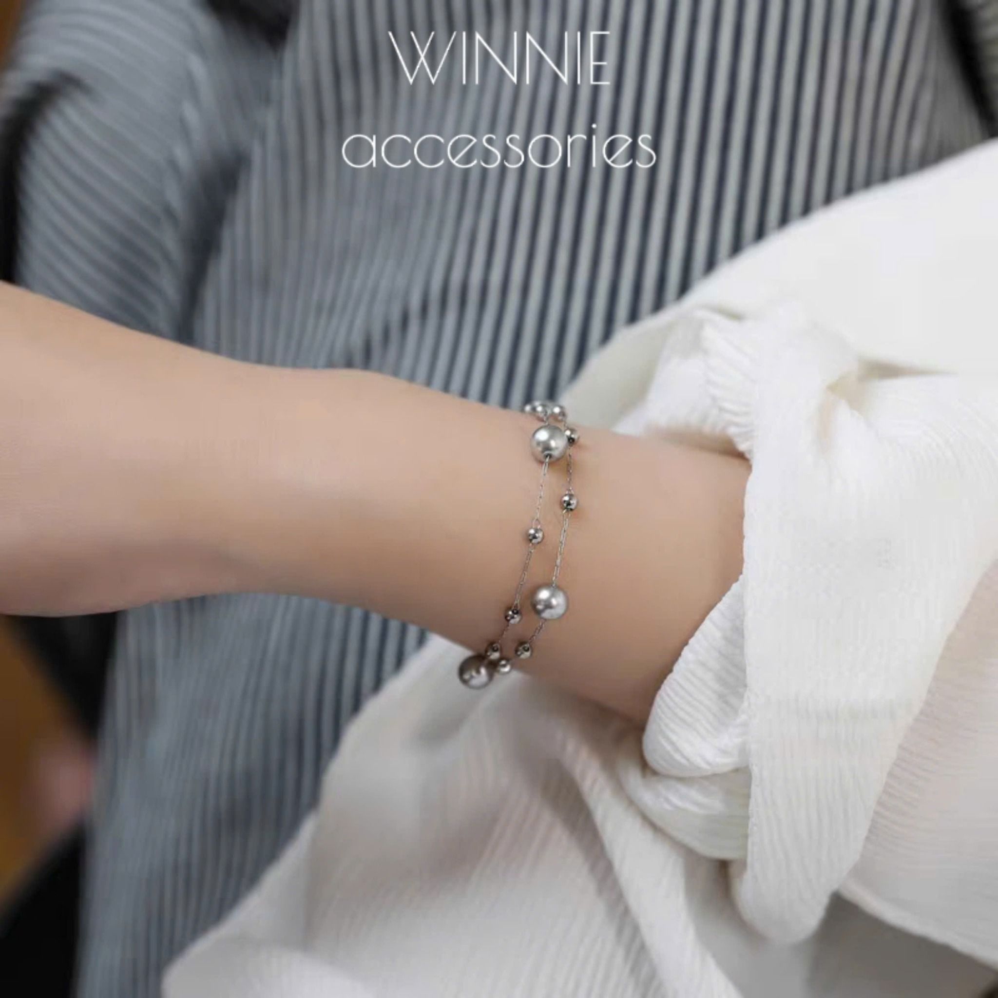 Lắc tay Titan Grey Pearl