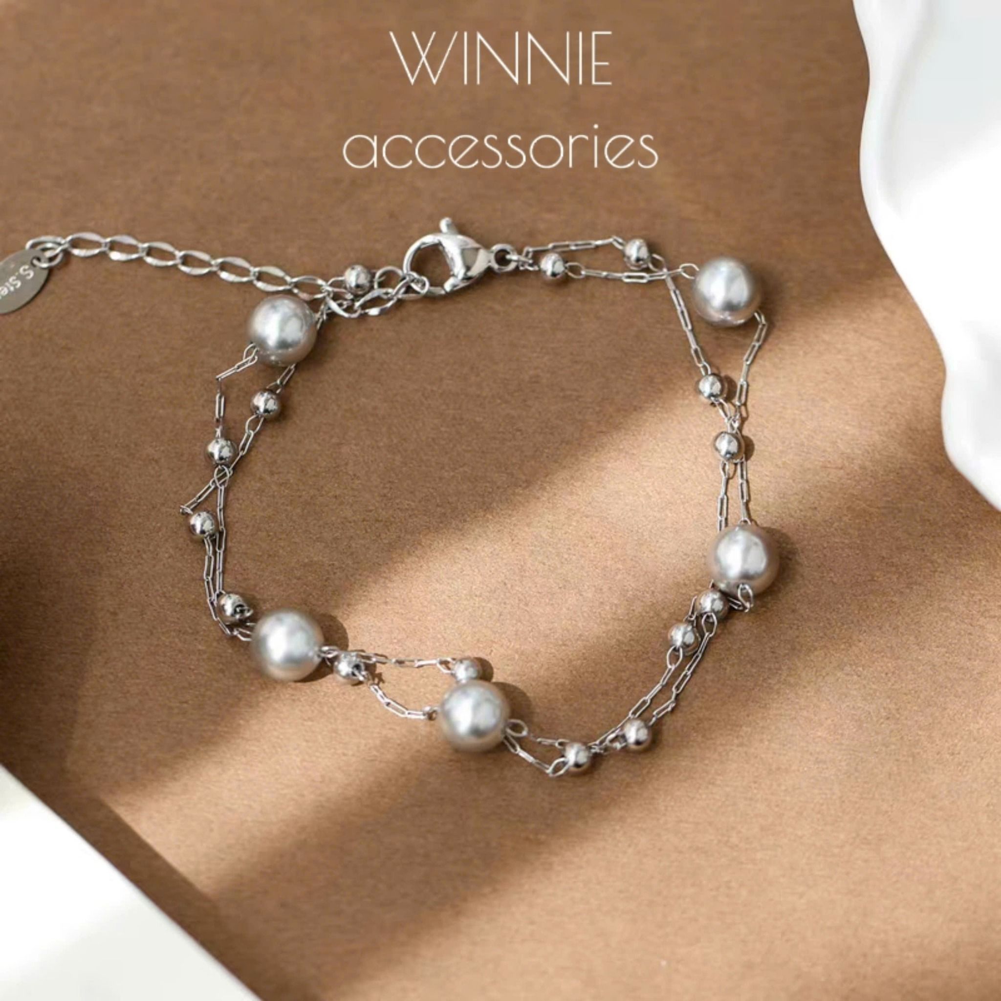 Lắc tay Titan Grey Pearl