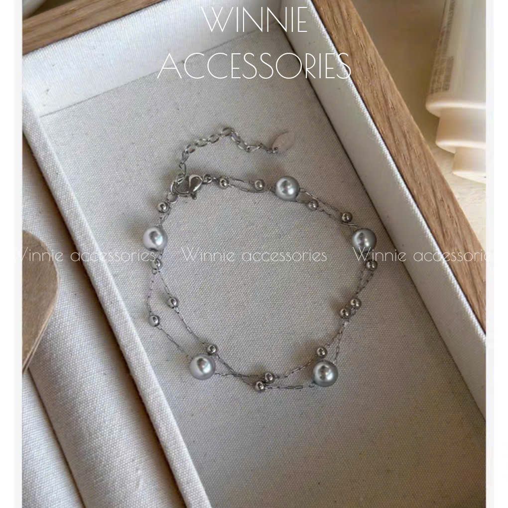 Lắc tay Titan Grey Pearl