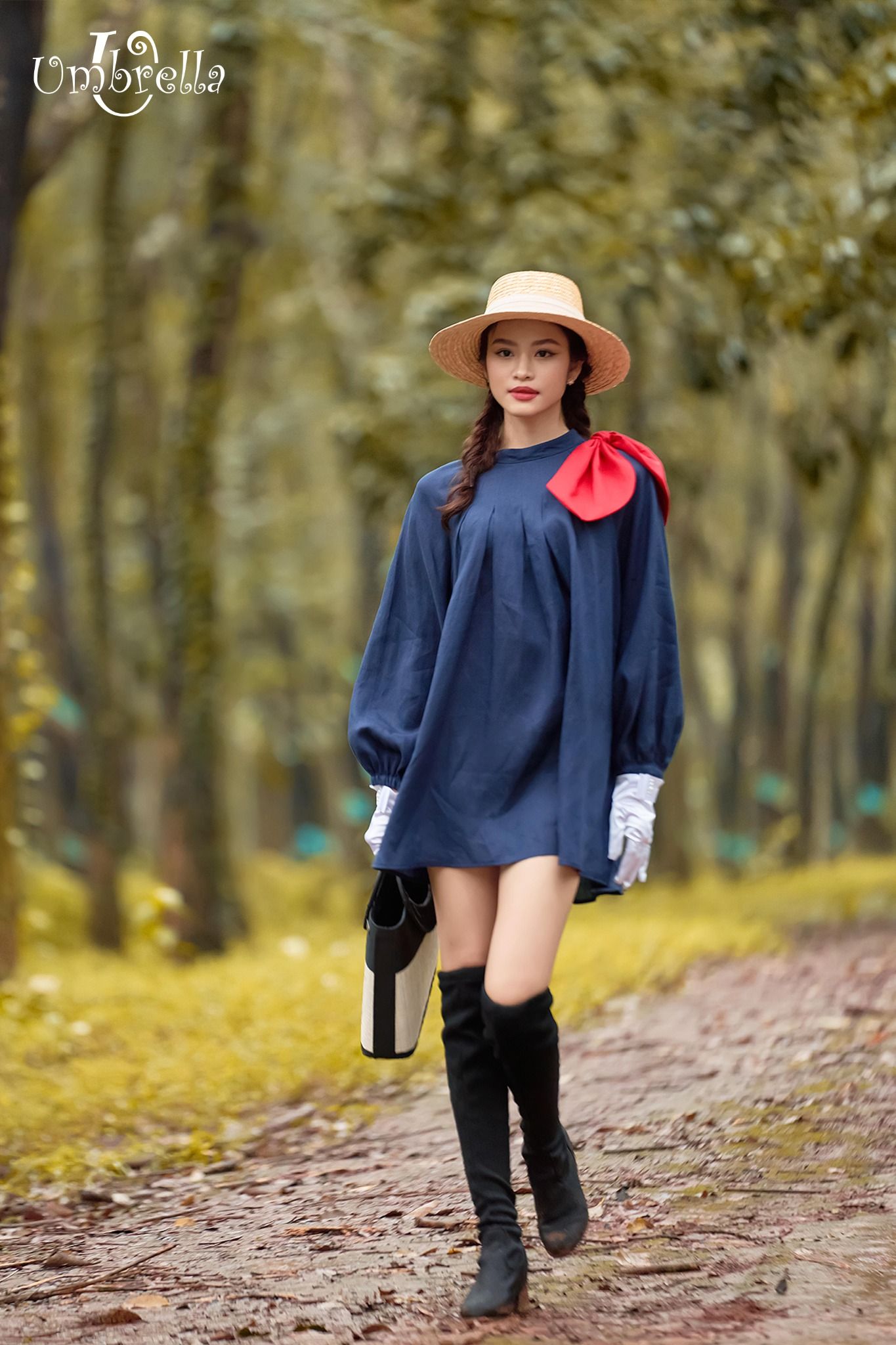 Đầm linen xếp ly rộng nơ vai