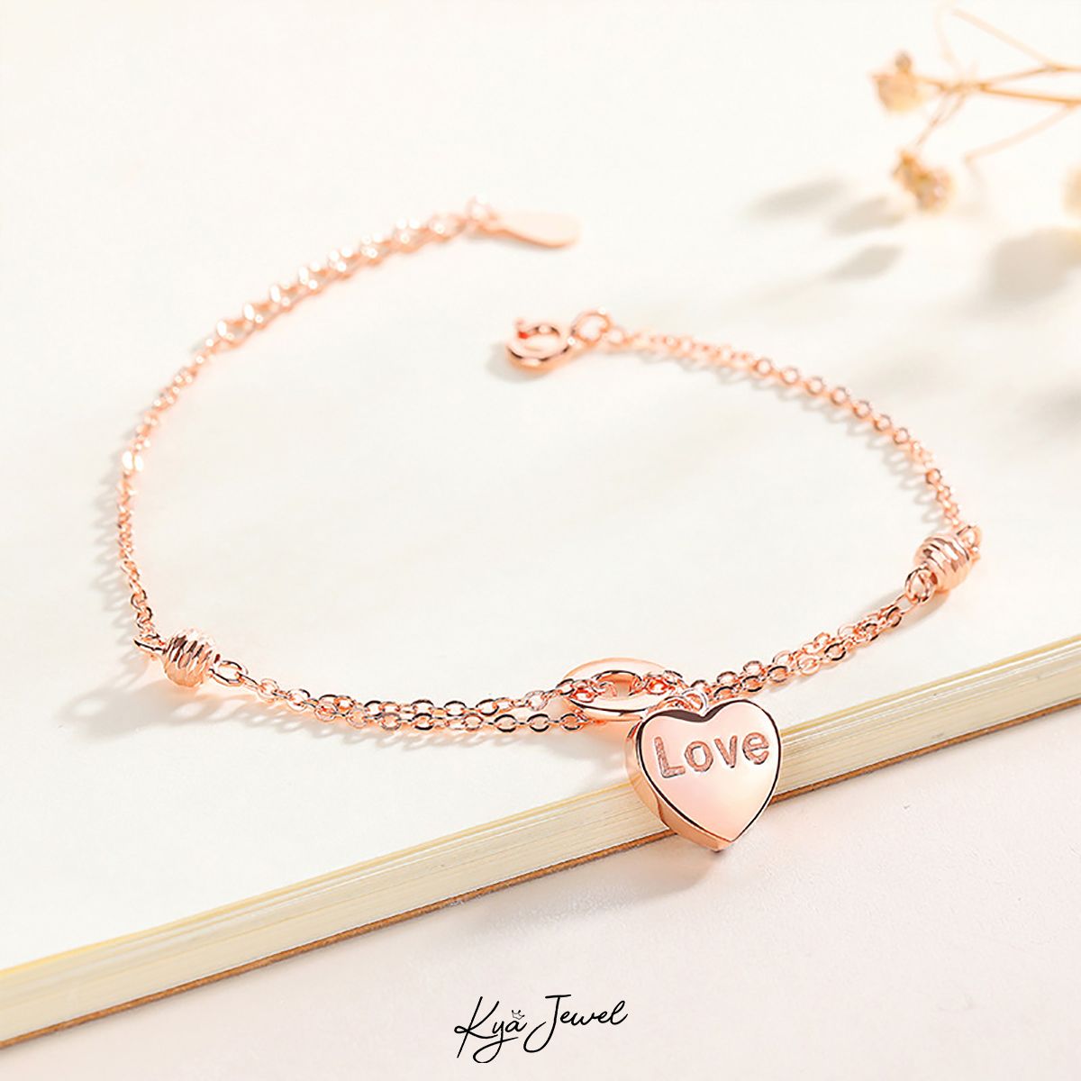 Lắc tay trái tim vàng hồng sang trọng