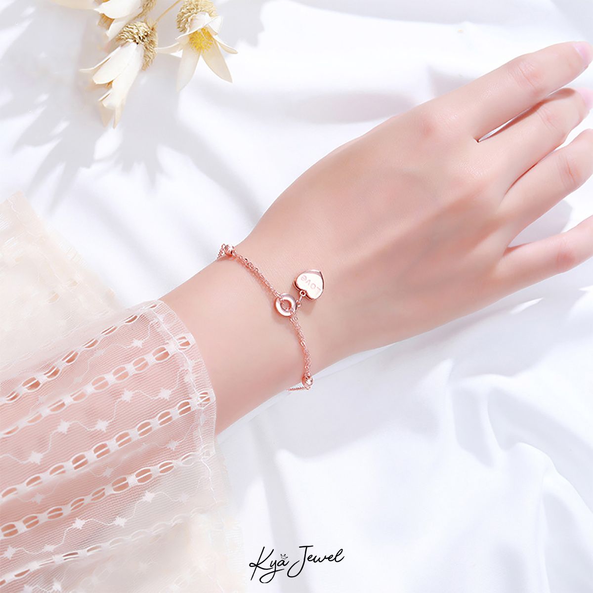 Lắc tay trái tim vàng hồng sang trọng