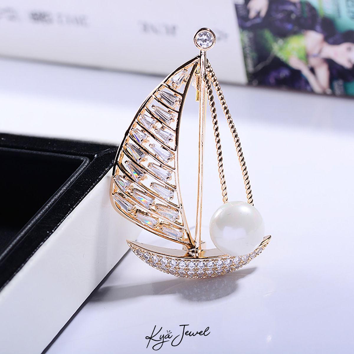 Cài áo thuyền bườm và ngọc trai