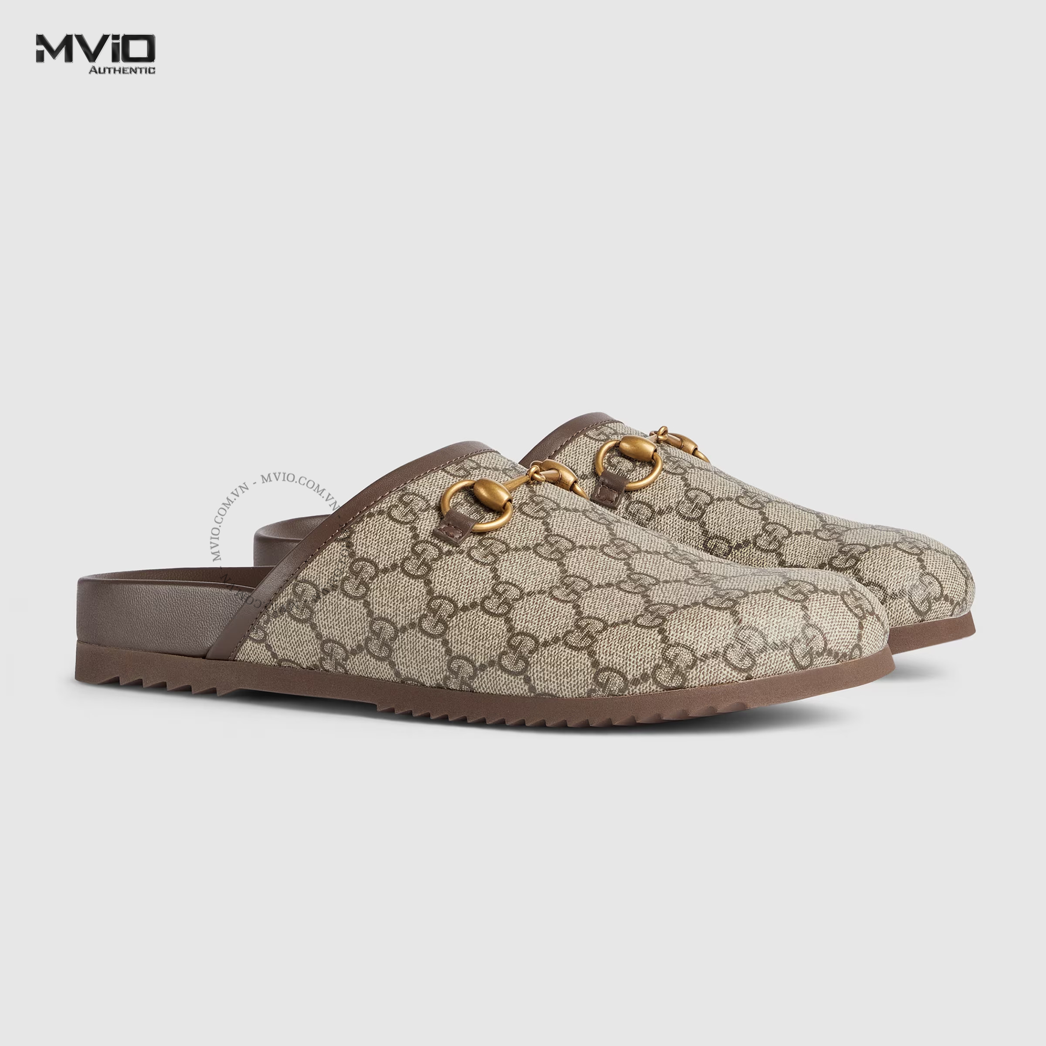SLIPPER GUCCI NÂU LOGO GG CANVAS KHÓA GOLD 749908