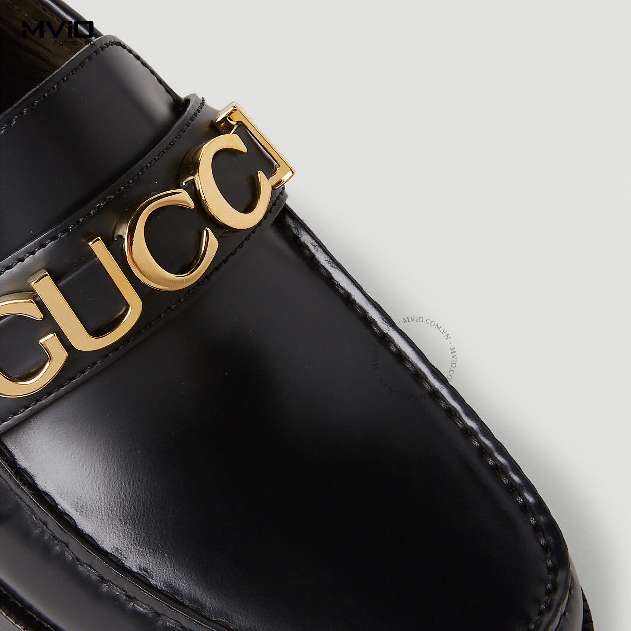 Loafer Gucci Đen Chữ Gucci Gold 699644 17X00
