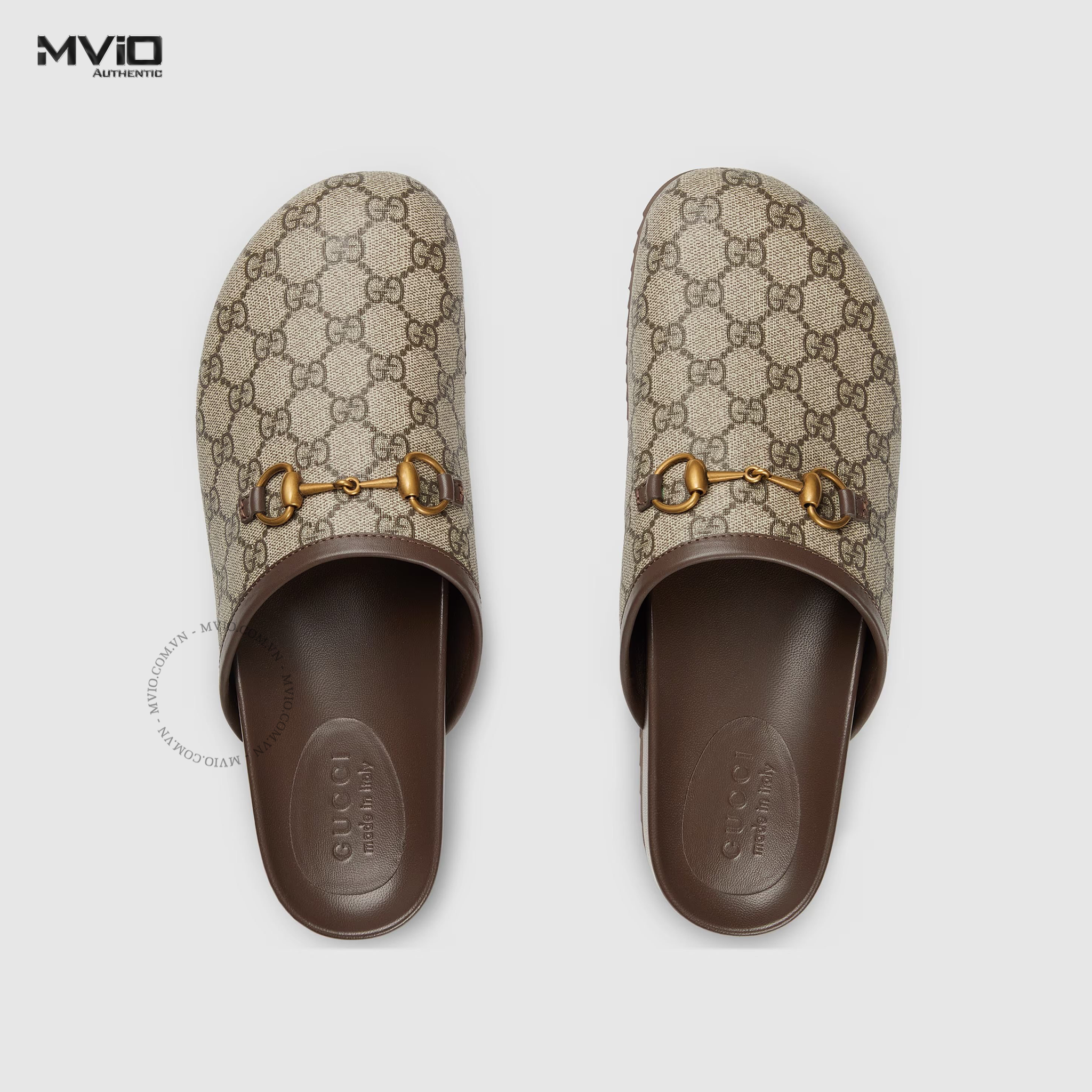 SLIPPER GUCCI NÂU LOGO GG CANVAS KHÓA GOLD 749908