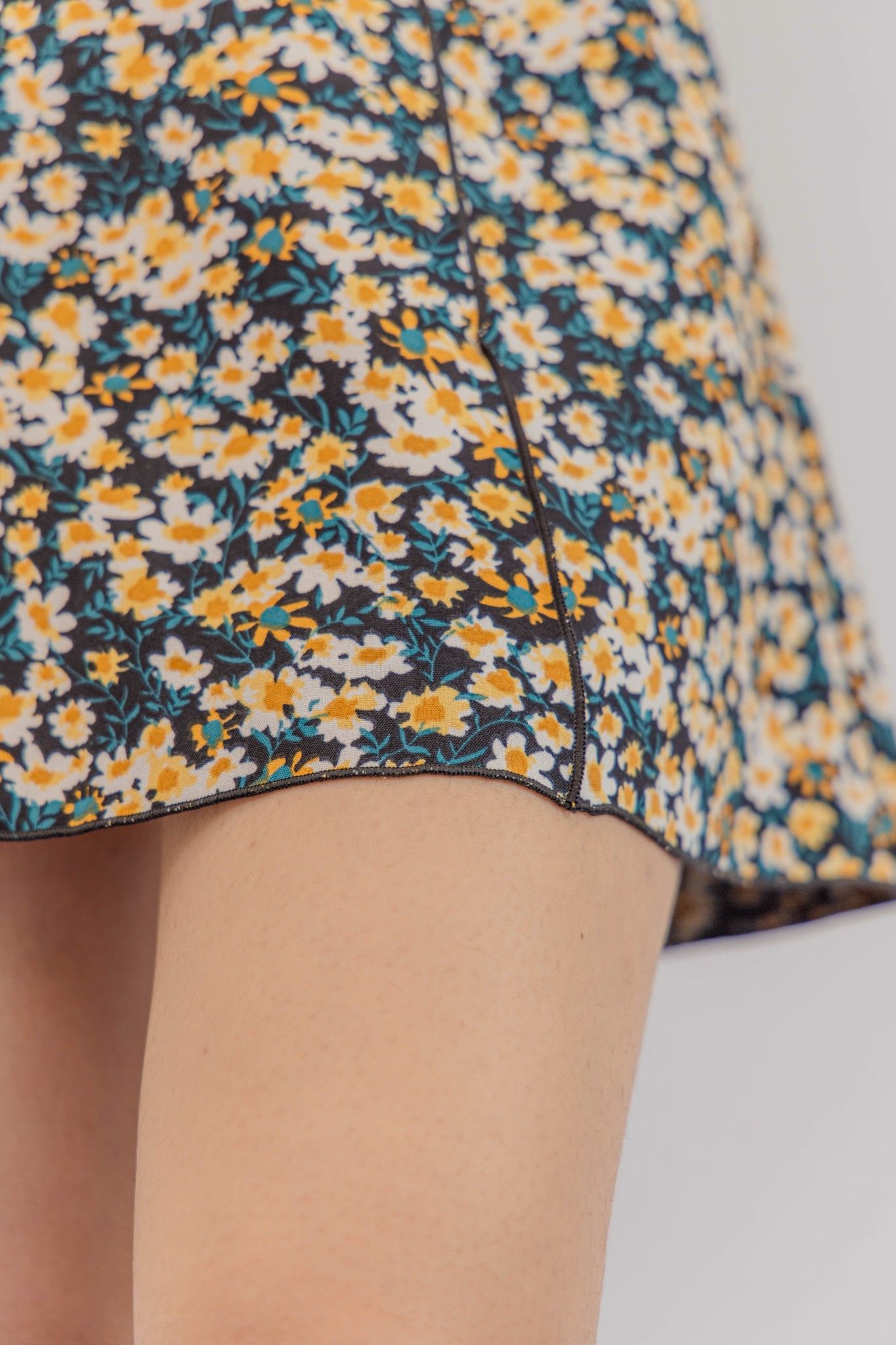 Floral Lettuce Hem Mini Skirt