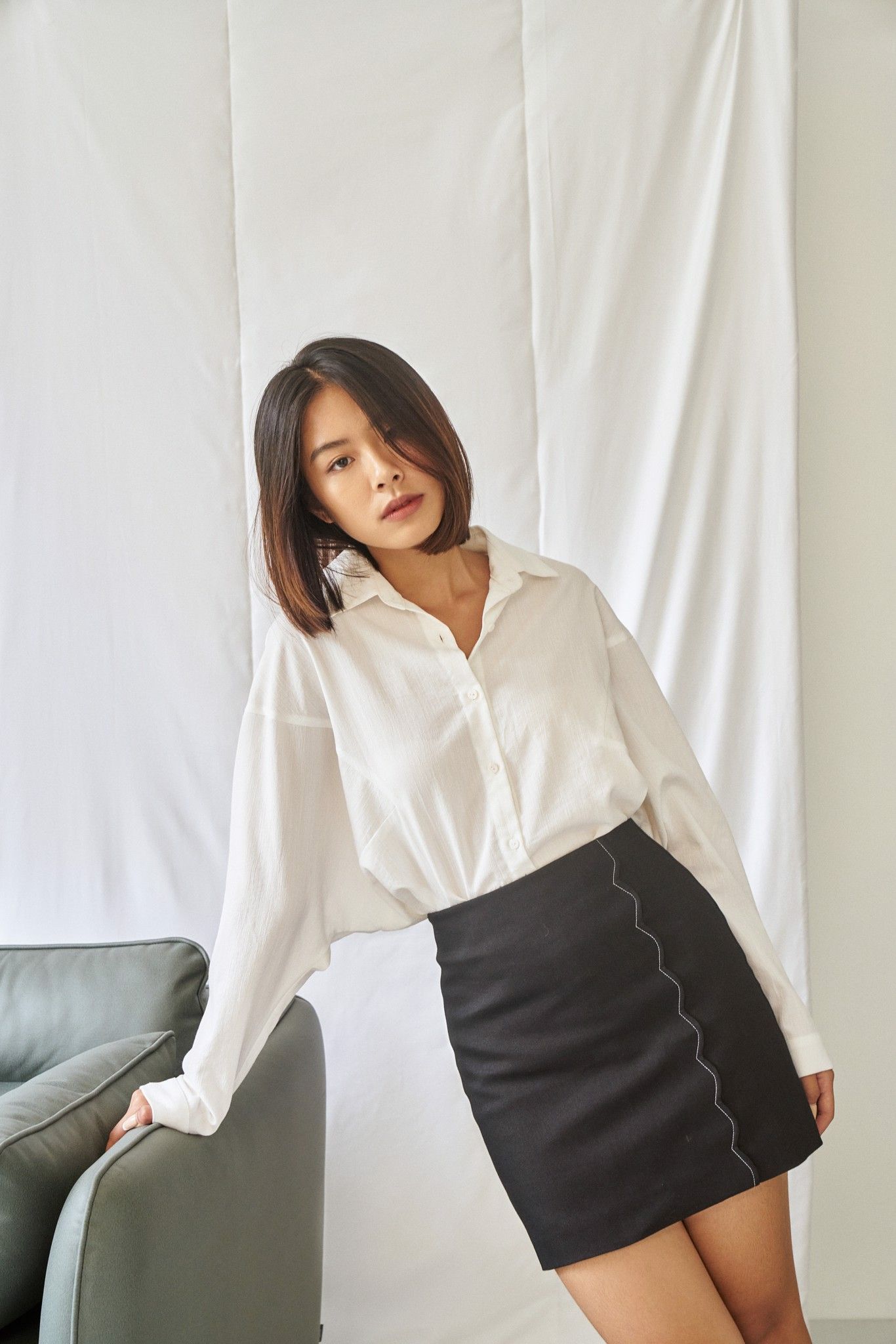 Black Mini Skirt With Scallop Details