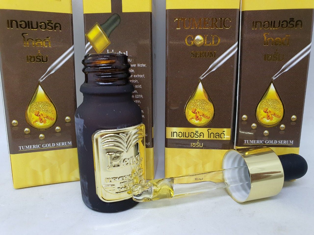 Herbal tumeric gold serum dưỡng trắng da trị mụn làm mờ vết thâm 10 gam