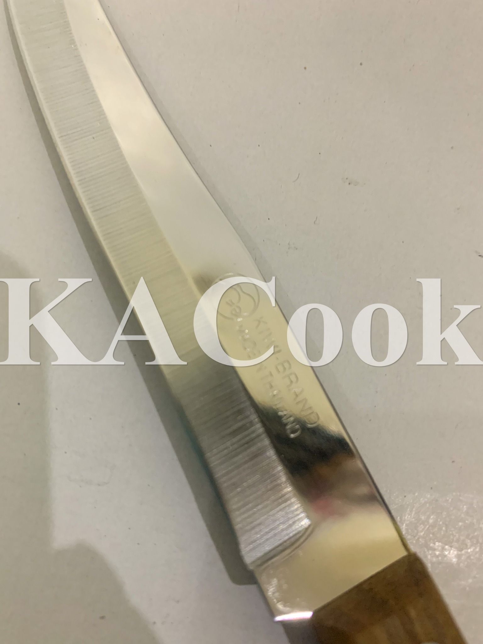 Dao Thái Kiwi 502 cán gỗ đầu bằng