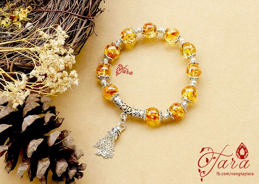 Vòng tay Hổ Phách mix charm bạc