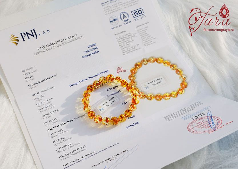Vòng tay Hổ Phách mix charm bạc