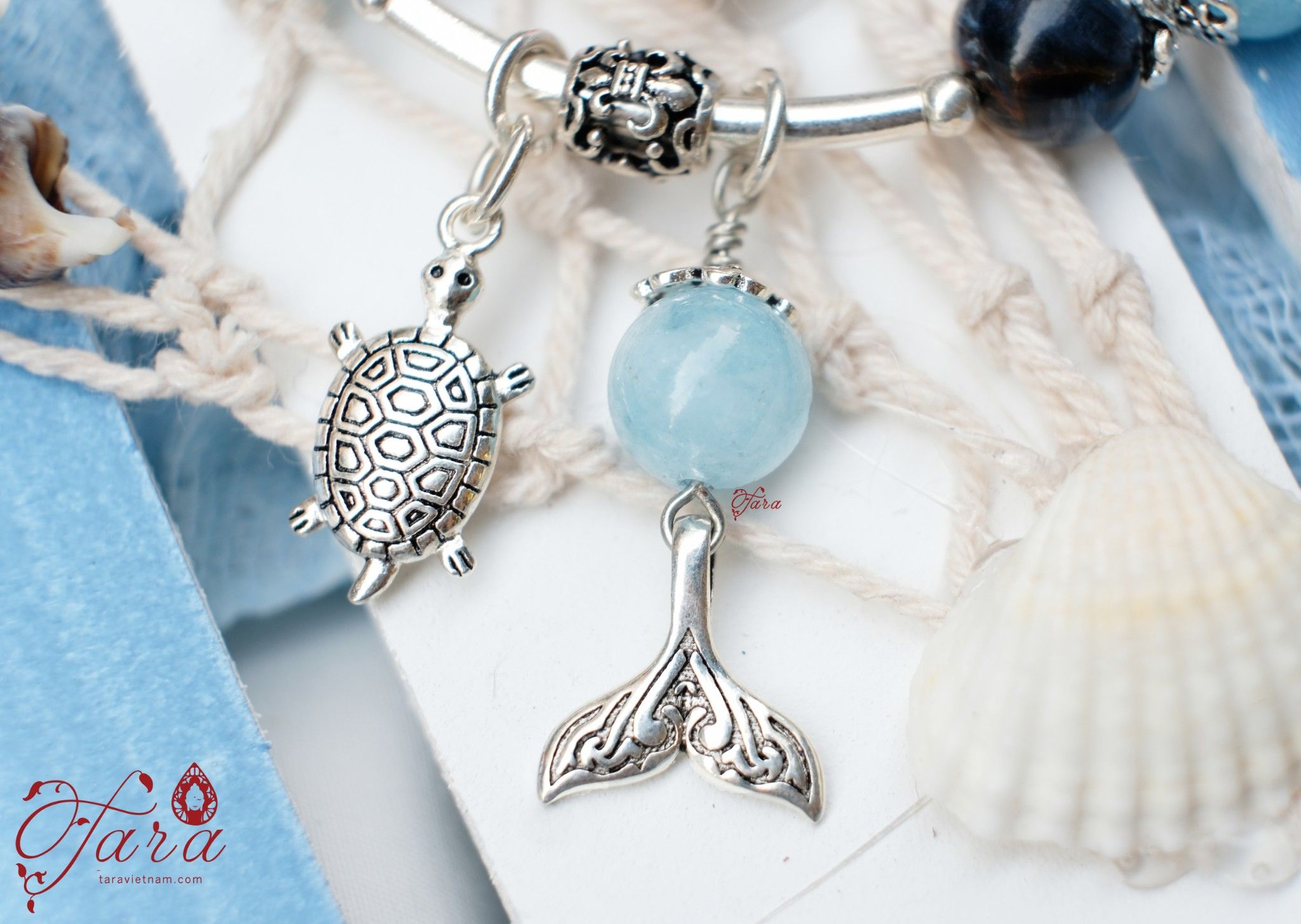 Vòng cặp đá Mắt Bão mix Aquamarine và Charm Bạc