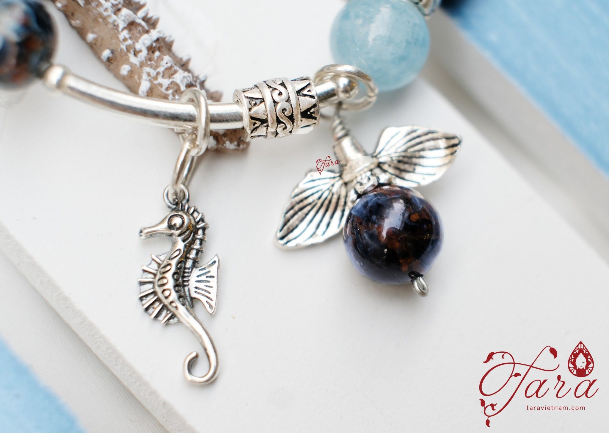 Vòng cặp đá Mắt Bão mix Aquamarine và Charm Bạc