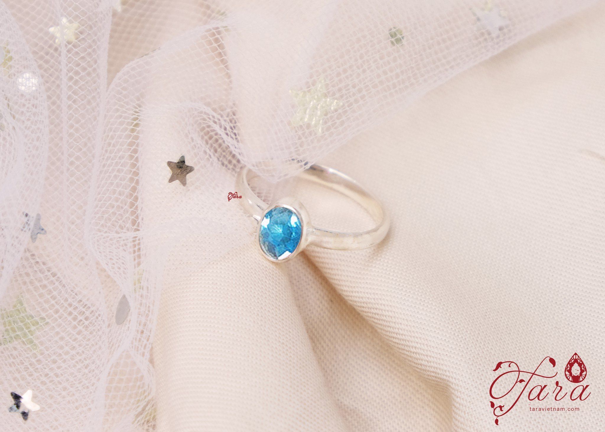 Nhẫn đá Topaz xanh trong bọc bạc cao cấp