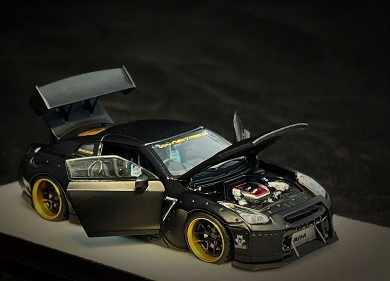 Mô hình xe cao cấp Nissan GTR R35 Rocket Pandem black full open Limited 999pcs tỉ lệ 1:64 PGM PGM-640702